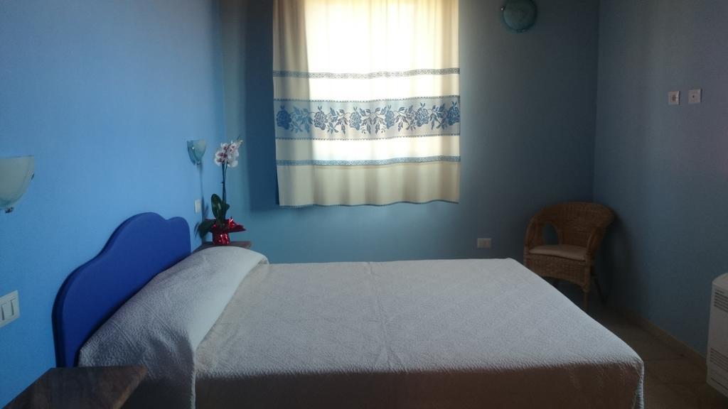 Aparthotel La Corte Dei Rei à Castiadas Chambre photo
