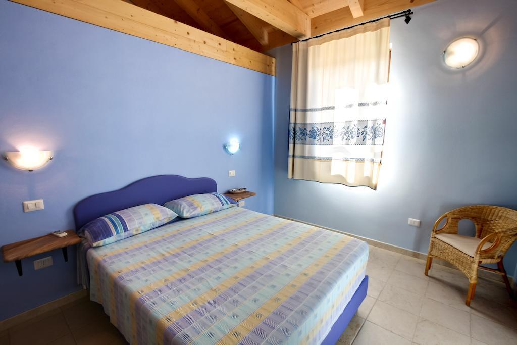 Aparthotel La Corte Dei Rei à Castiadas Chambre photo
