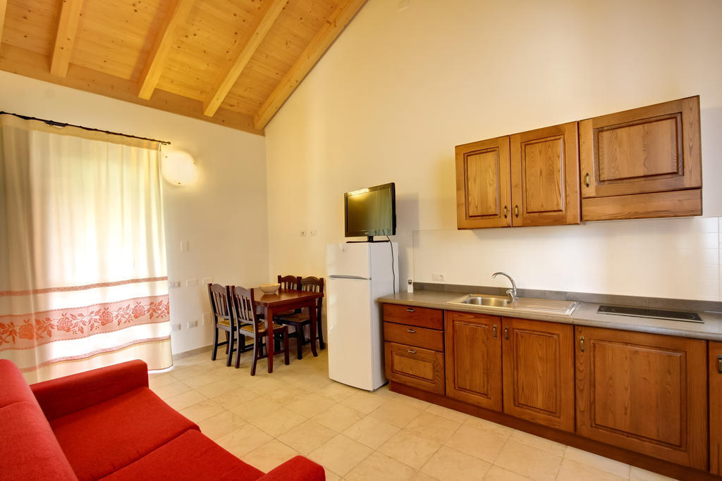 Aparthotel La Corte Dei Rei à Castiadas Chambre photo