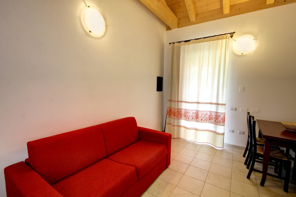 Aparthotel La Corte Dei Rei à Castiadas Chambre photo