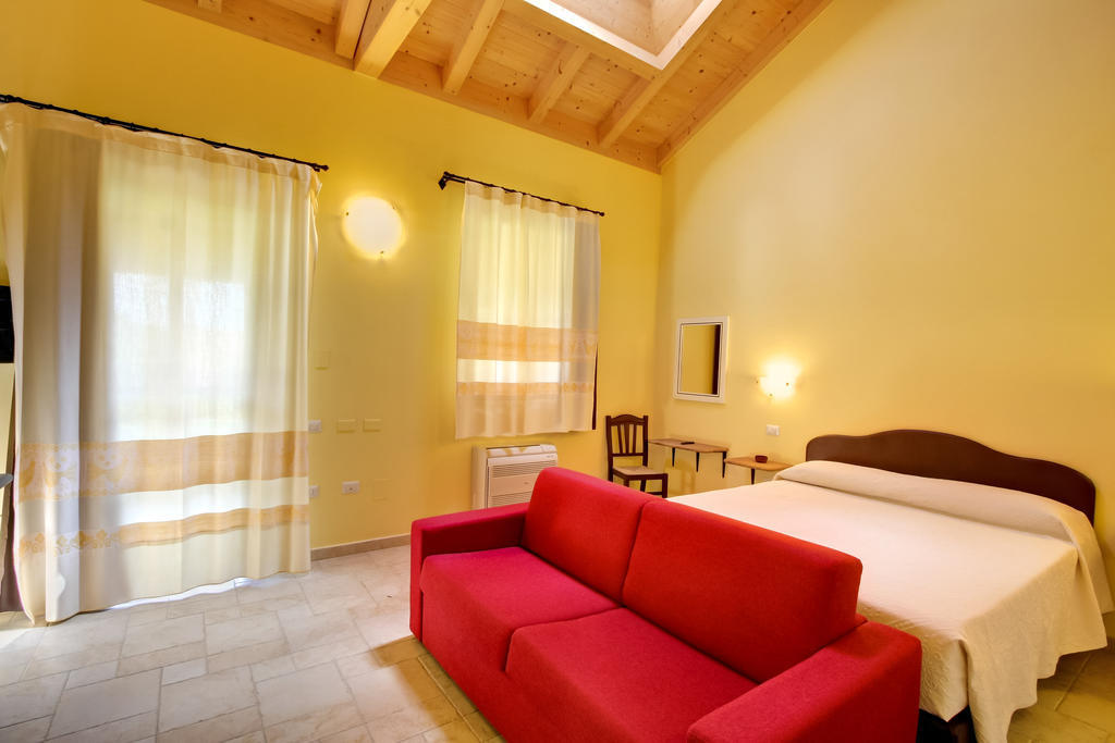 Aparthotel La Corte Dei Rei à Castiadas Chambre photo