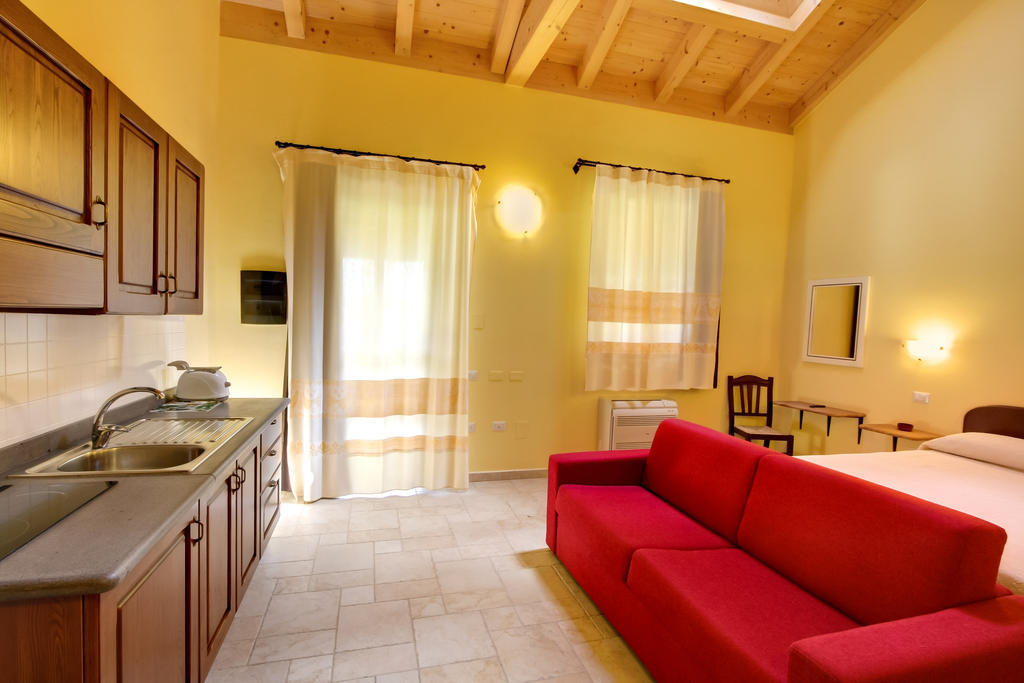 Aparthotel La Corte Dei Rei à Castiadas Chambre photo