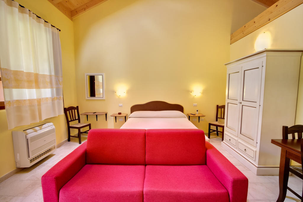 Aparthotel La Corte Dei Rei à Castiadas Chambre photo