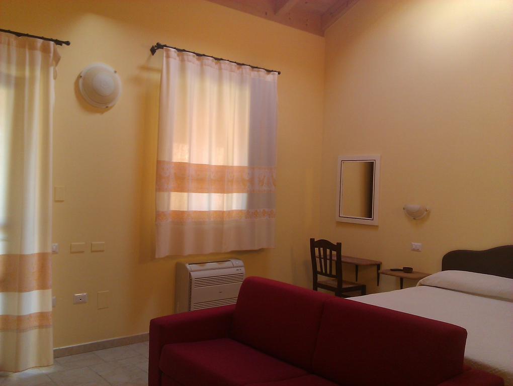 Aparthotel La Corte Dei Rei à Castiadas Chambre photo