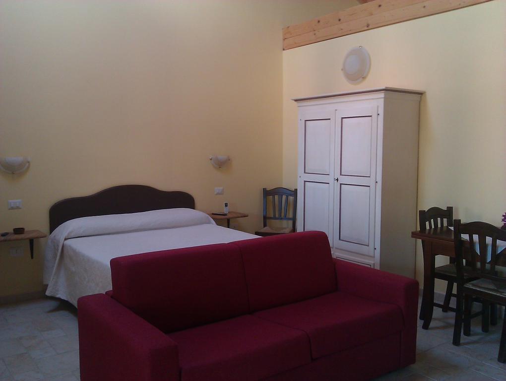 Aparthotel La Corte Dei Rei à Castiadas Chambre photo